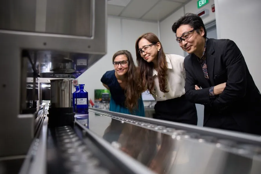 IFF employees with the Colibri system in the Singapore facility